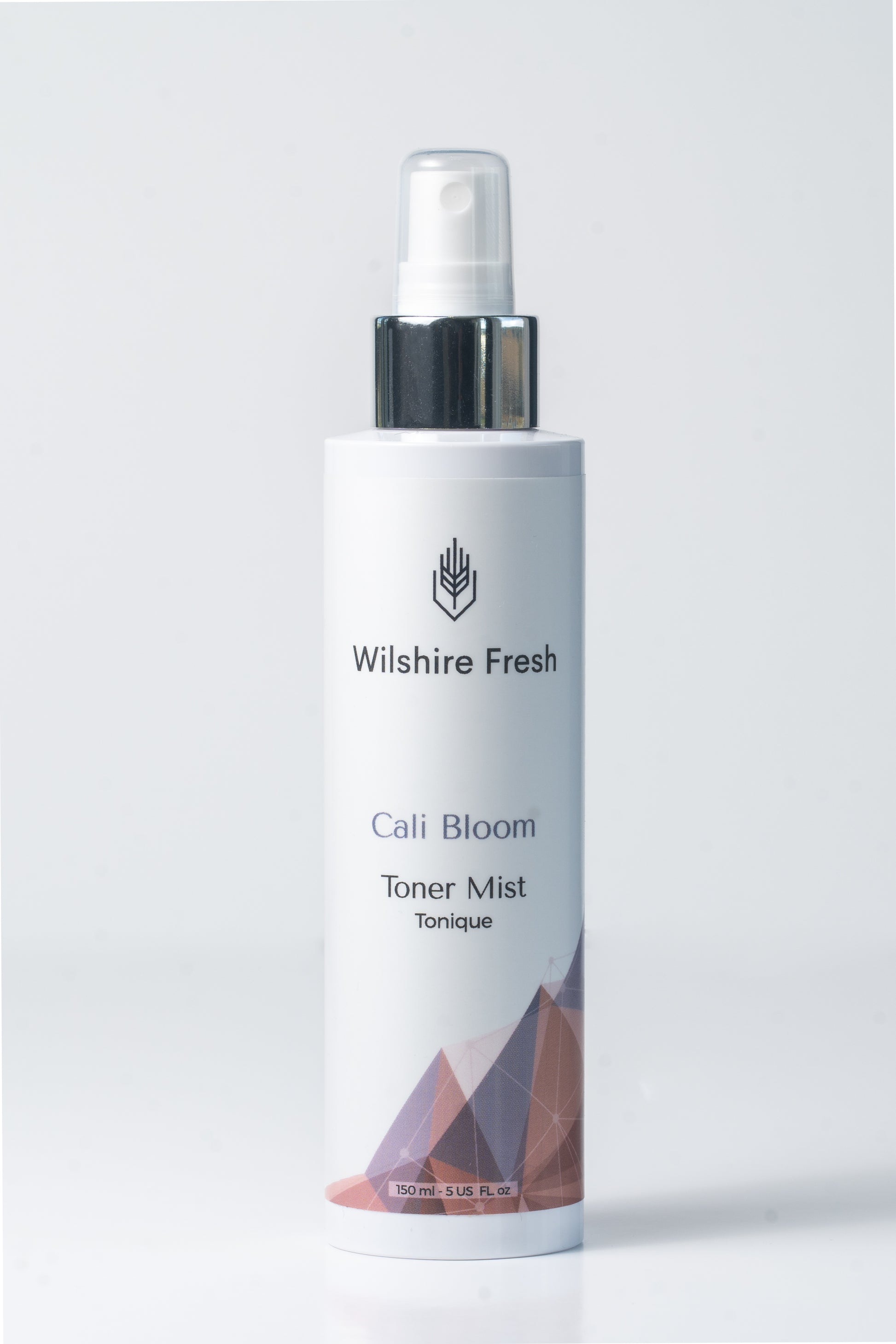 A refreshing cell blossom toner mist in a sleek bottle, designed to hydrate and revitalize the skin with floral essence.